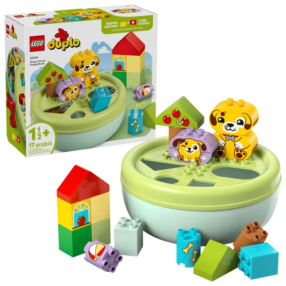 Caixa LEGO DUPLO 10441 Casa de Filhotes lacrada ao lado do produto montado, 17 peças