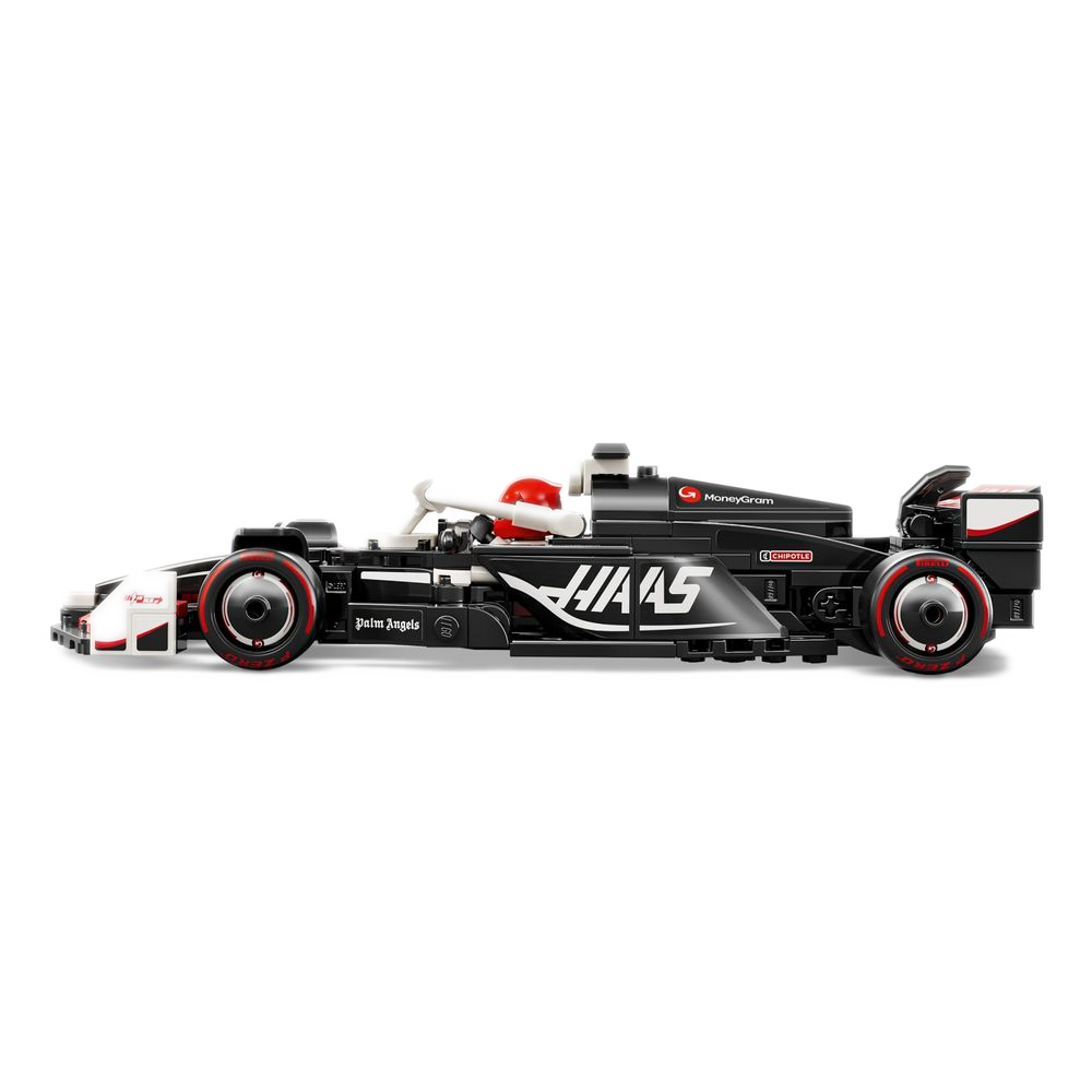 Lateral da VF-24 mostrando livery preto-carbono e logo HAAS