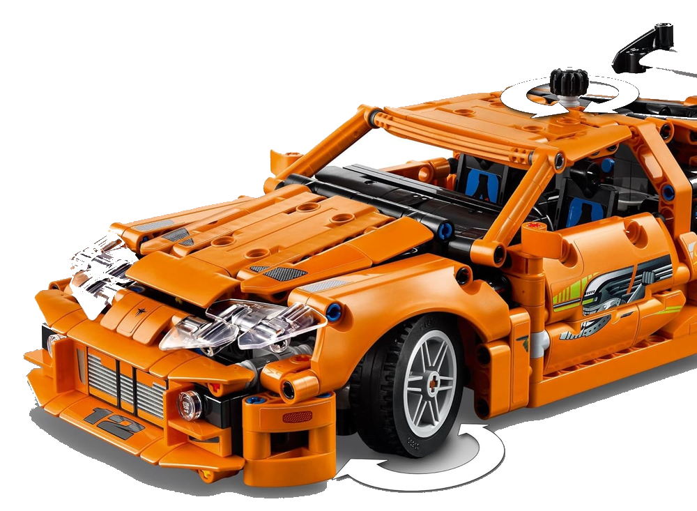 Lateral 3/4 frontal da Toyota Supra MK4 mostrando rodas e decalques verdes